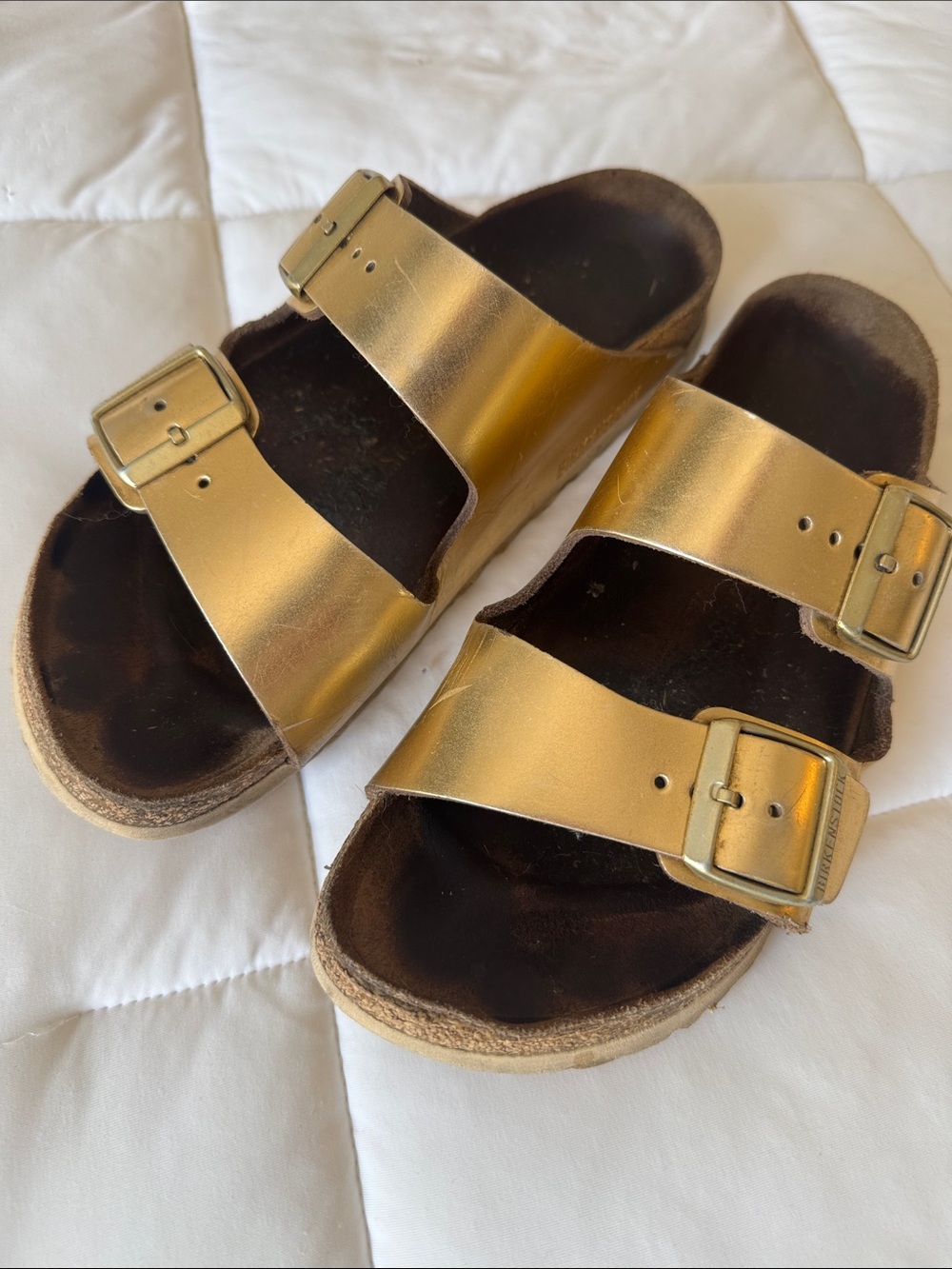 Birkenstock women’s Metallic Gold Two-Strap Slide Sandals